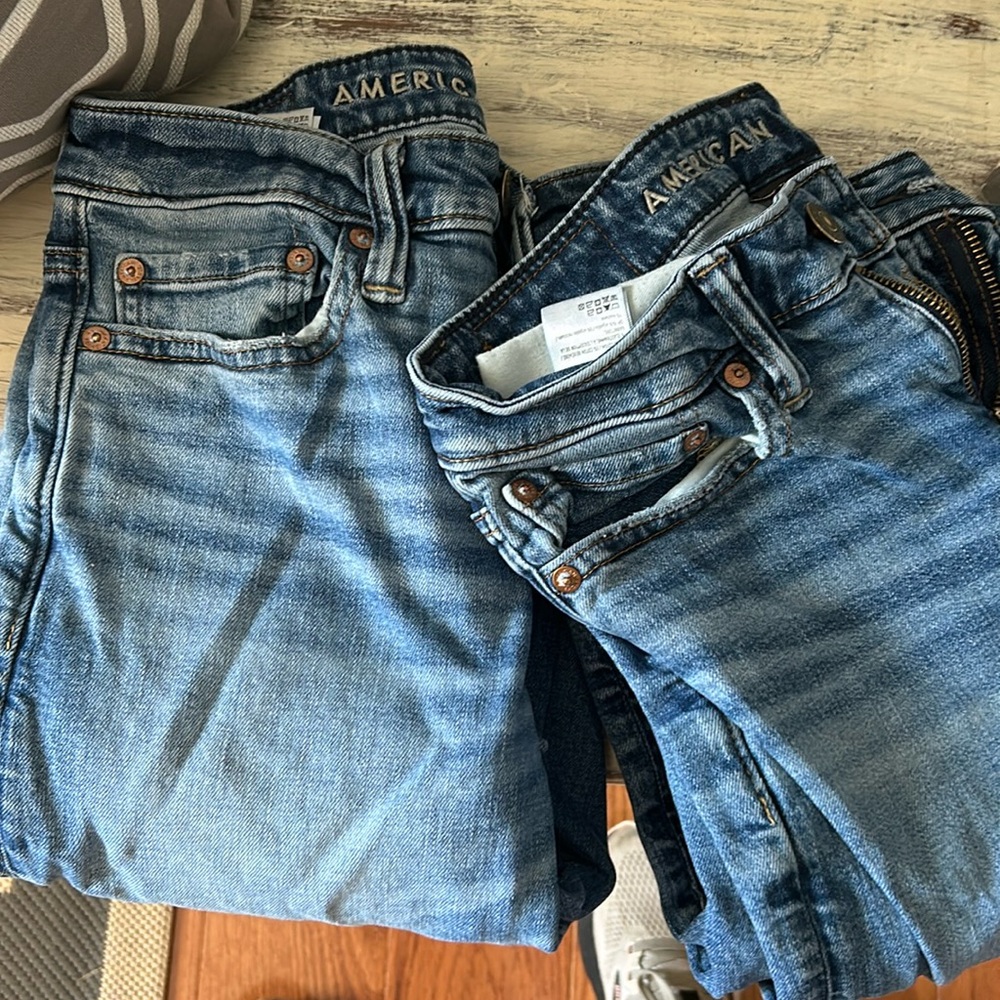 2 pairs American eagle air flex bootcut jeans